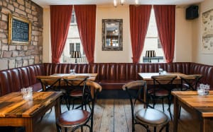 Clean, tidy and cosy dining area at The Sun Hotel & Bar
