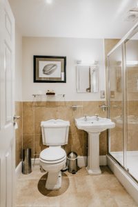 Hotel Bathroom - Toilet, sink and shower
