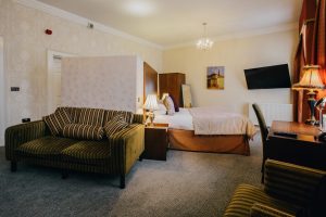 Hotel Room - Bed, table and couch