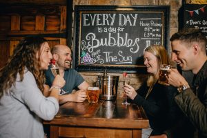People enjoying a drink in the dining area