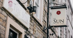 The Sun Hotel & Bar Sign